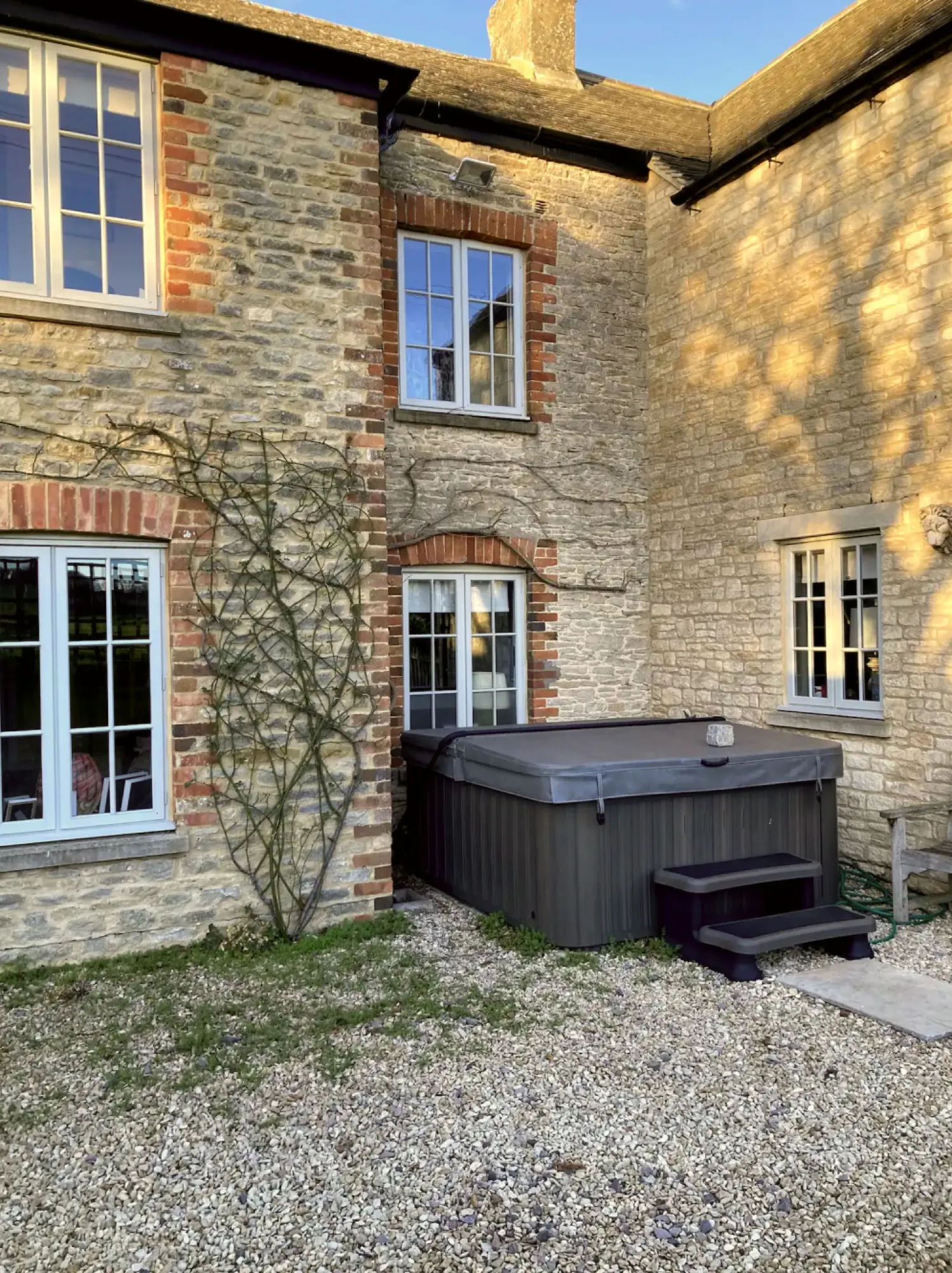 The house and private hot tub courtyard