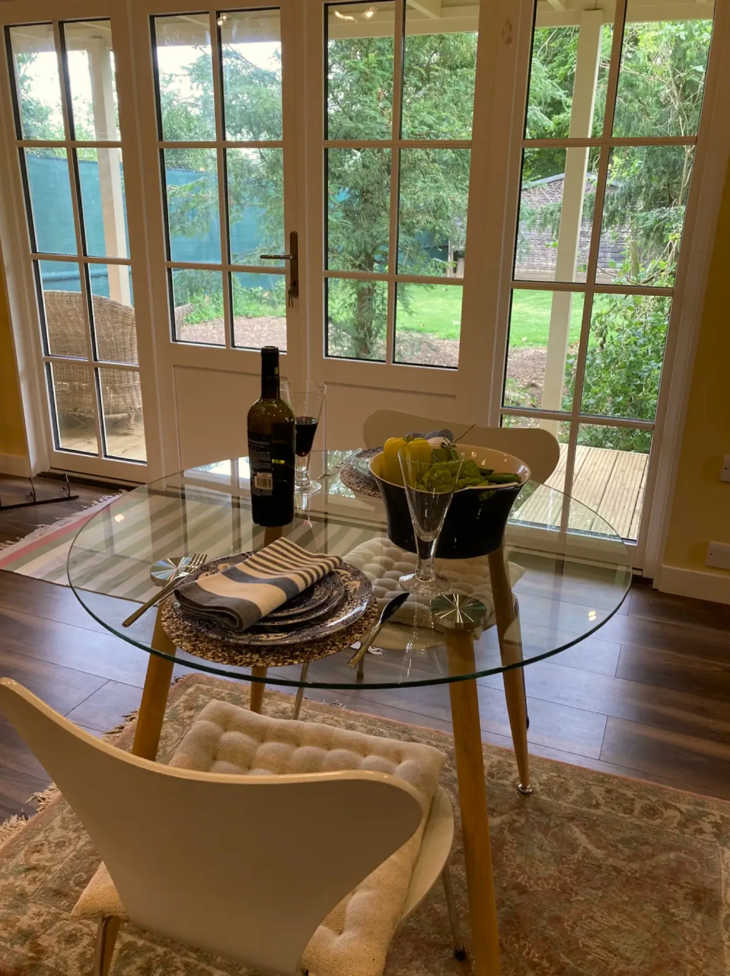 The dining table with a glass of wine